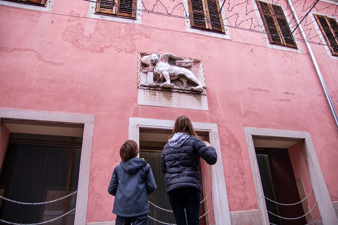 Family adventure in Koper Winged cat quest - Stop 2: Taverna Koper and the city’s waterfront setting