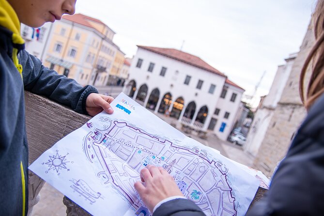 Family adventure in Koper Winged cat quest - Stop 4: Da Ponte Fountain and the search for details