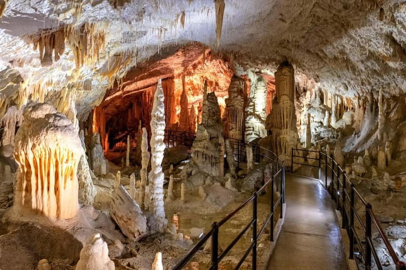 Koper/Trieste: Postojna Cave & Predjama Castle Tour & Ticket - Riding the electric train into Postojna Cave