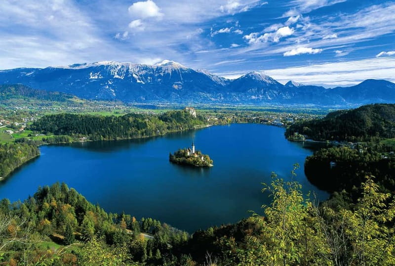 Ljubljana: Lake Bled and Bohinj Tour with Savica Waterfall - Taking the pletna to Bled Island