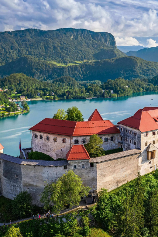 Ljubljana: Lake Bled, Postojna Cave, and Predjama Day Tour - Predjama Castle above the cliff