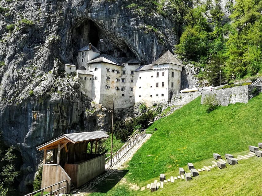 Ljubljana: Postojna Cave and Predjama Castle Tour - Predjama Castle in a cliff face