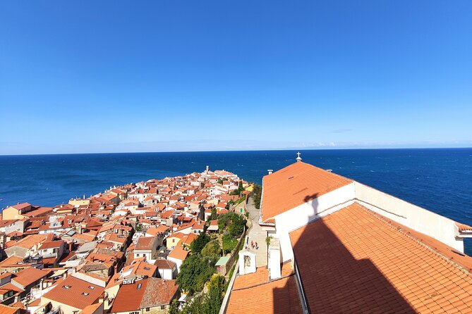 Piran Old Town Walking Tour - First of May Square shows an older Piran