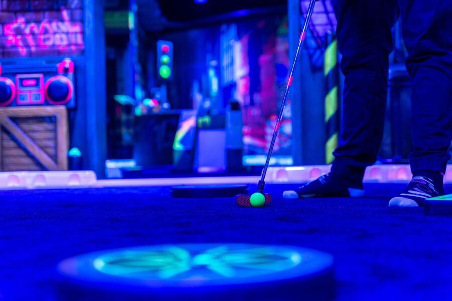 Woop! Glow Golf: Maribor - Playing Mini Golf in a Neon Maribor Setting